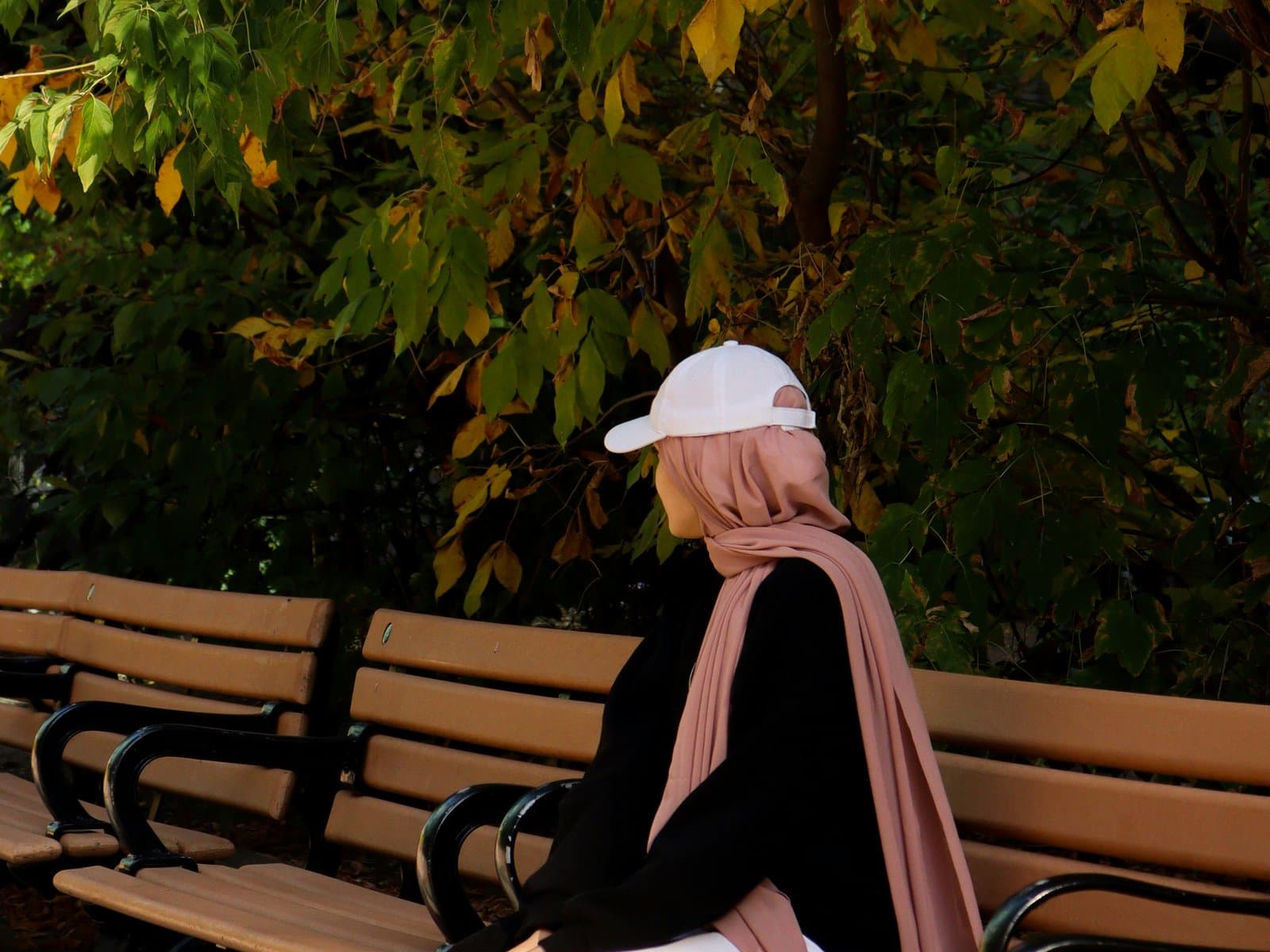 Young woman in a soft hijab representing the Amal budget edit