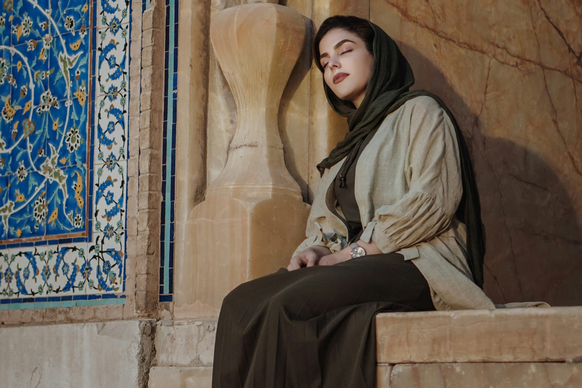 Woman wearing a soft green Zahéen-style hijab